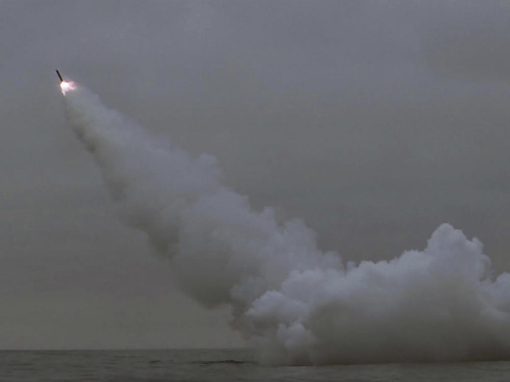 This photo provided by the North Korean government shows what it says is a cruise missile the country test-fired from a submarine off the east coast of North Korea early Sunday, March 12, 2023.