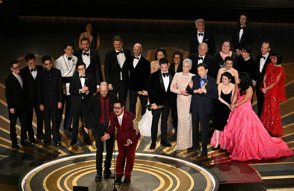 Directors Daniel Scheinert and Daniel Kwan speak after winning the Oscar for best picture for <em>Everything Everywhere All at Once.</em>