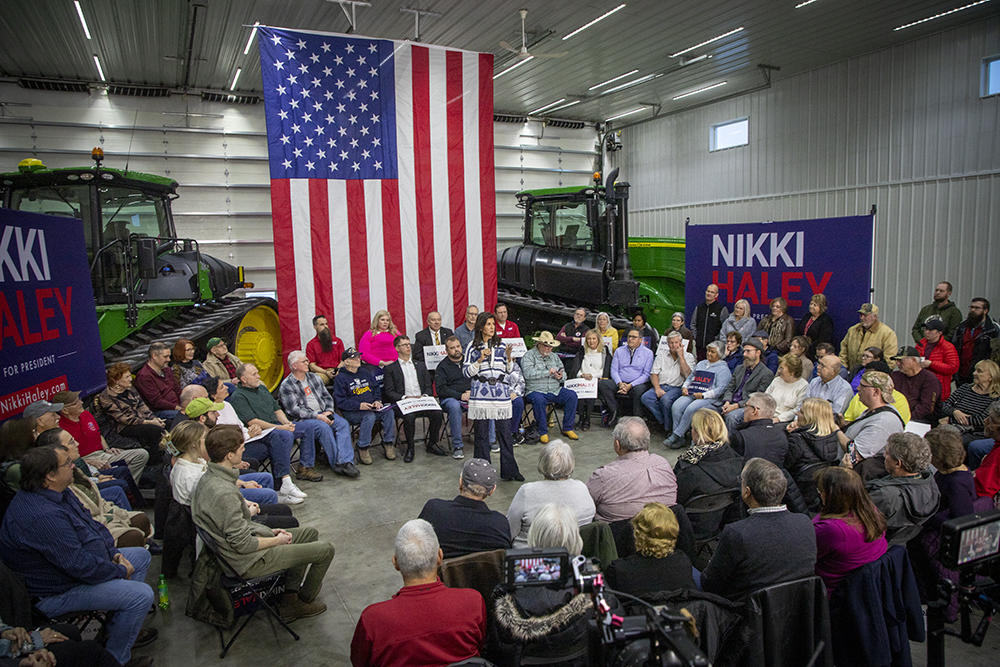 Former U.N. Ambassador and South Carolina Gov. Nikki Haley speaks to a crowd at a farm in Nevada, Iowa, on March 9, during her second trip to Iowa as a Republican presidential candidate.