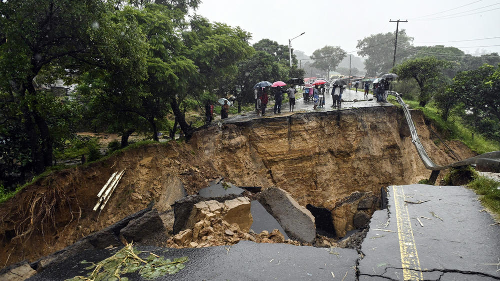 A road connecting the cities of Blantyre and Lilongwe is seen damaged Tuesday in Malawi following heavy rains caused by Tropical Cyclone Freddy.