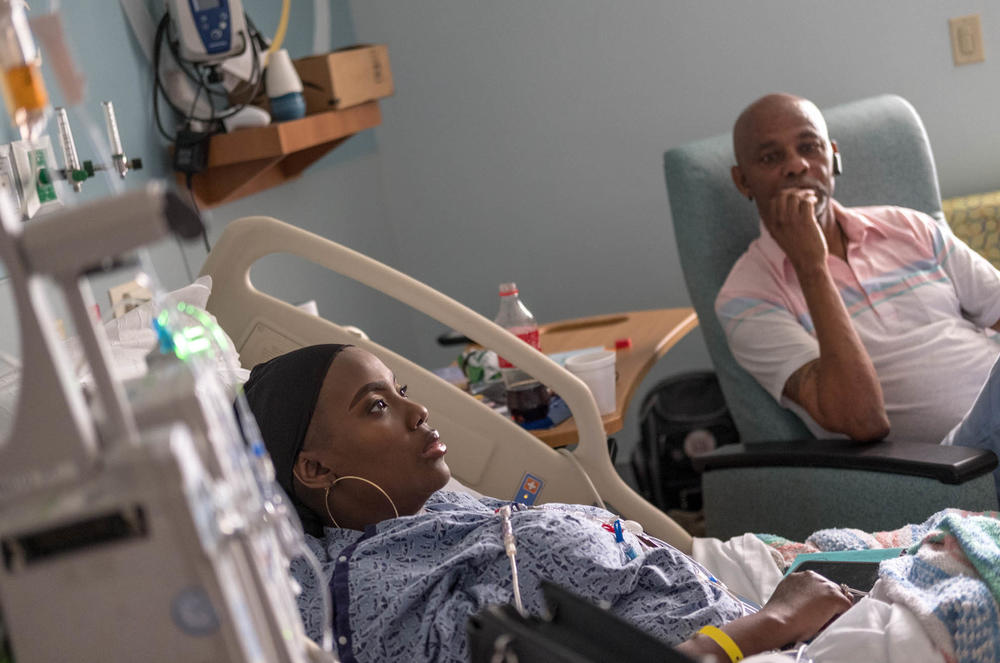 In 2019, Gray was recovering after billions of her bone marrow cells had been modified, using the gene-editing technique CRISPR, and reinfused into her body. Her father, Timothy Wright (right), traveled from Mississippi to Nashville, Tenn., to keep her company.