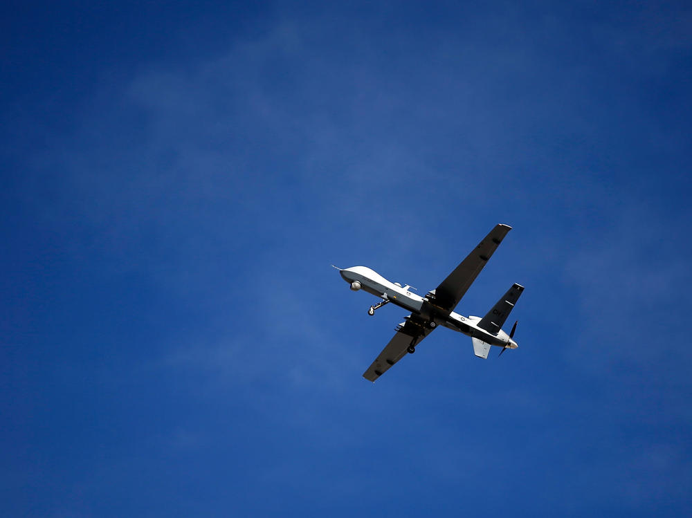 An MQ-9 Reaper remotely piloted aircraft flies by during a training mission at Creech Air Force Base in Nevada on Nov. 17, 2015.