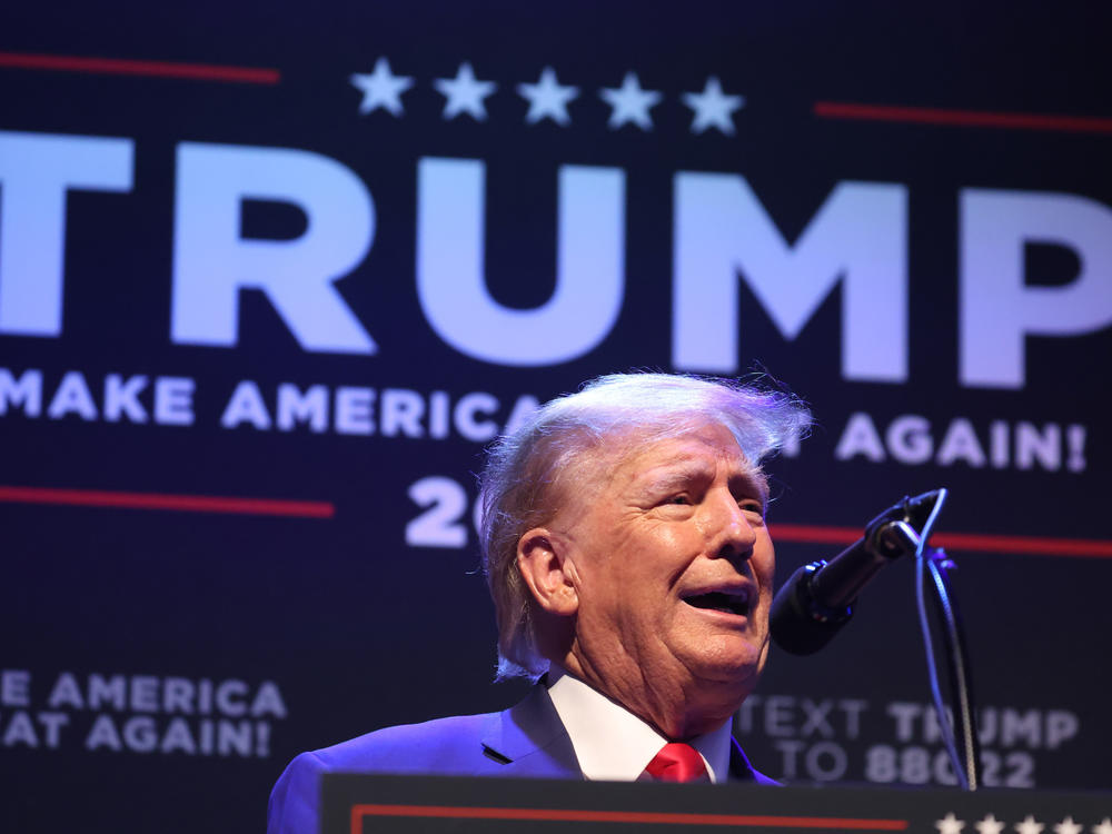 Former President Donald Trump speaks to guests gathered for an event at the Adler Theatre on March 13 in Davenport, Iowa.