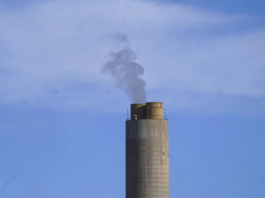 A smokestack stands at a coal plant on June 22, 2022, in Delta, Utah. The Environmental Protection Agency issued a final rule Wednesday to restrict smokestack emissions from power plants and other industrial sources that burden downwind areas with smog-causing pollution they can't control. (