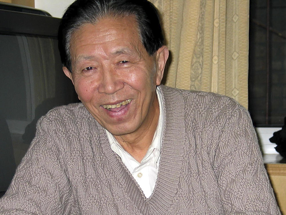 Military surgeon Jiang Yanyong is seen in a hotel room in Beijing on Feb. 9, 2004. Jiang Yanyong, a Chinese military doctor who revealed the full extent of the 2003 SARS outbreak and was later placed under house arrest for his political outspokenness, has died, a long-time acquaintance and a Hong Kong newspaper said on March 14, 2023.