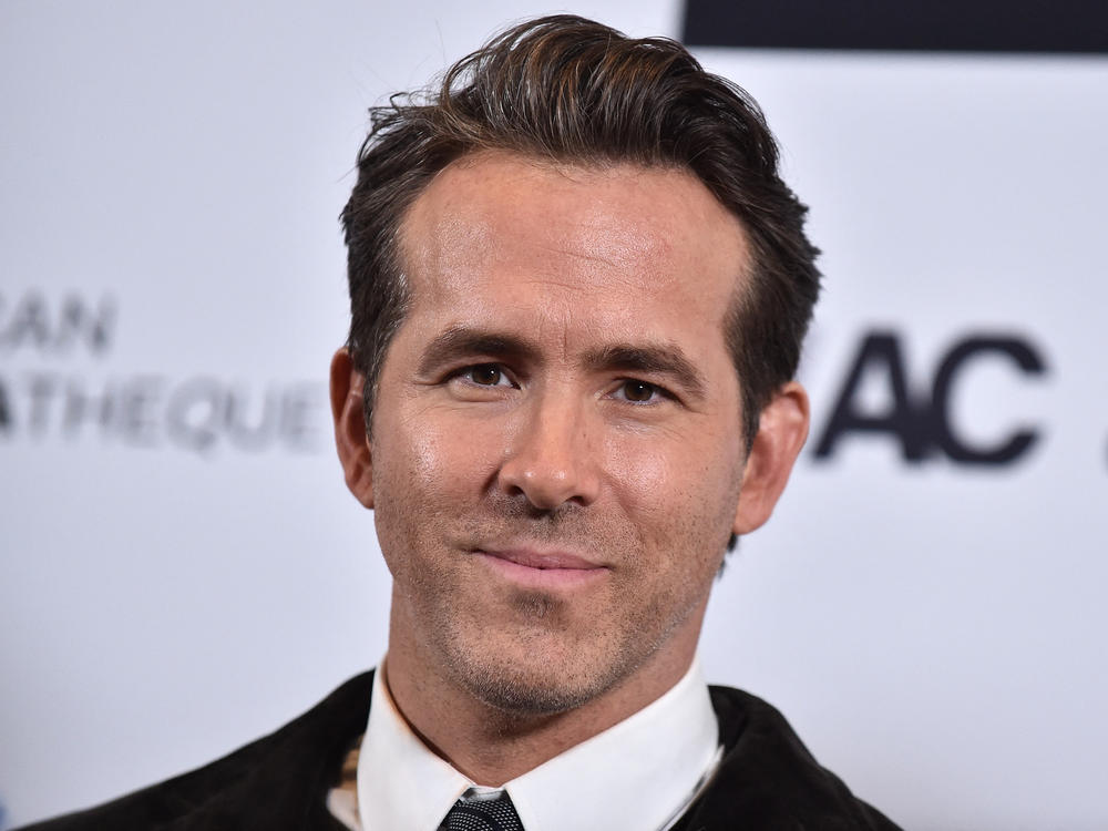 Actor Ryan Reynolds is part owner of Mint Mobile and stars in ads for the budget cellular carrier which is being sold to T-Mobile.