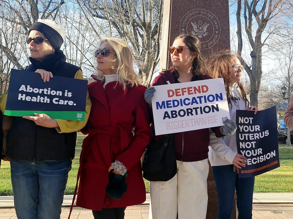 Abortion rights advocates gather in front of the J. Marvin Jones Federal Building and Courthouse in Amarillo, Texas, on Wednesday. U.S. abortion opponents are hoping to get a national ban on a widely used abortion pill through their lawsuit against the FDA.