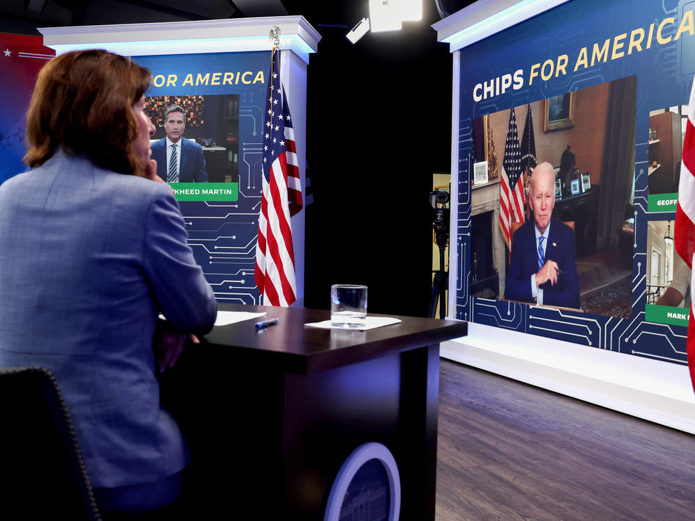 Secretary of Commerce Gina Raimondo listens as President Biden participates virtually in a meeting on the CHIPS Act on July 25, 2022, in Washington, D.C.