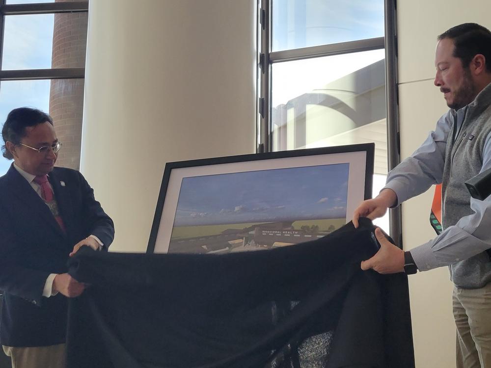 Principal Chief Chuck Hoskin (left) and Deputy Chief Bryan Warner unveil the first phase of a $75 million investment by the Cherokee Nation in new addiction treatment facilities.