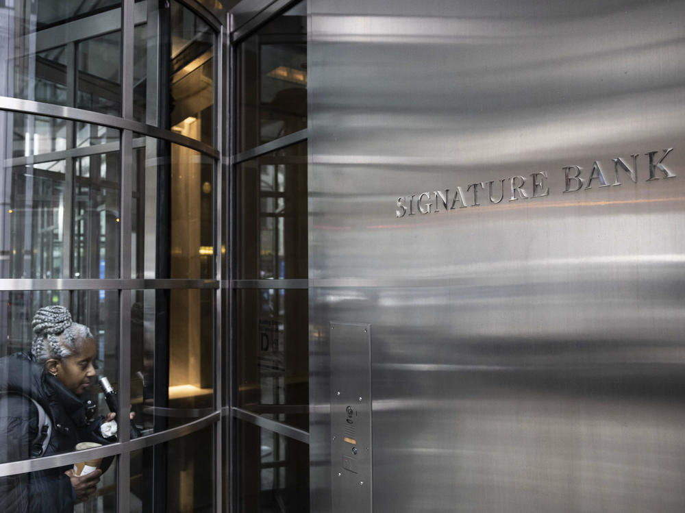 A person enters the Signature Bank headquarters in New York on March 13.