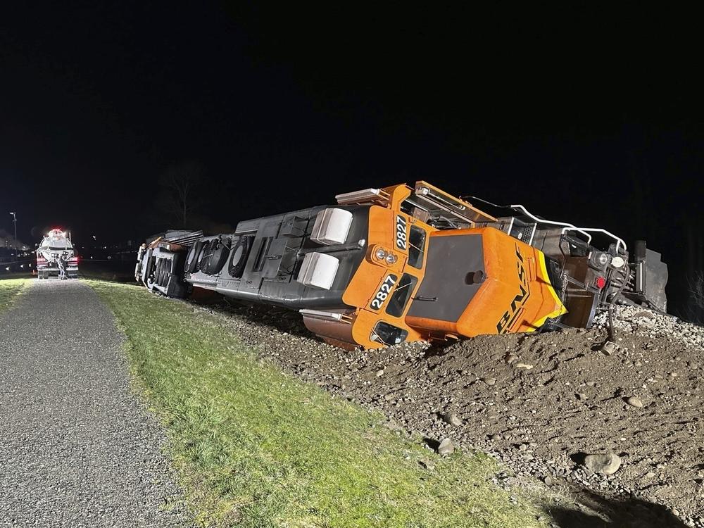 This photo provided by the Washington Department of Ecology shows a derailed BNSF train on the Swinomish tribal reservation near Anacortes, Wash. on Thursday, March 16, 2023.