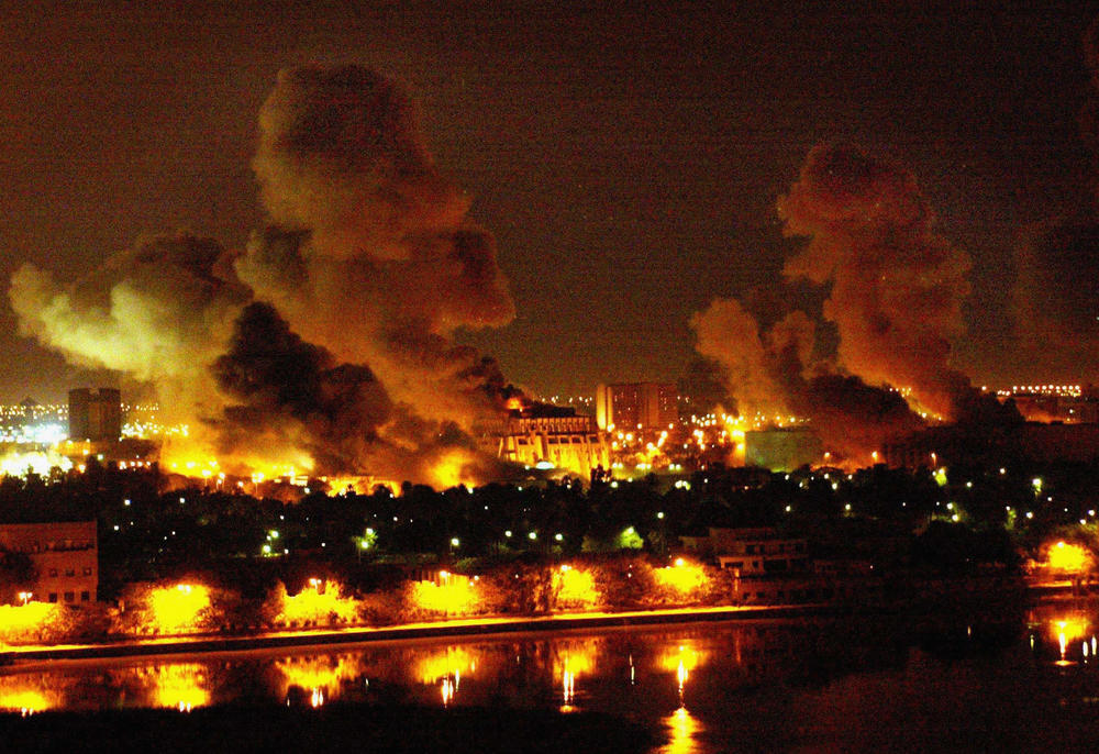 March 21, 2003: Fires burn in and around Saddam Hussein's Council of Ministers in Baghdad, Iraq, during a wave of attacks in the 