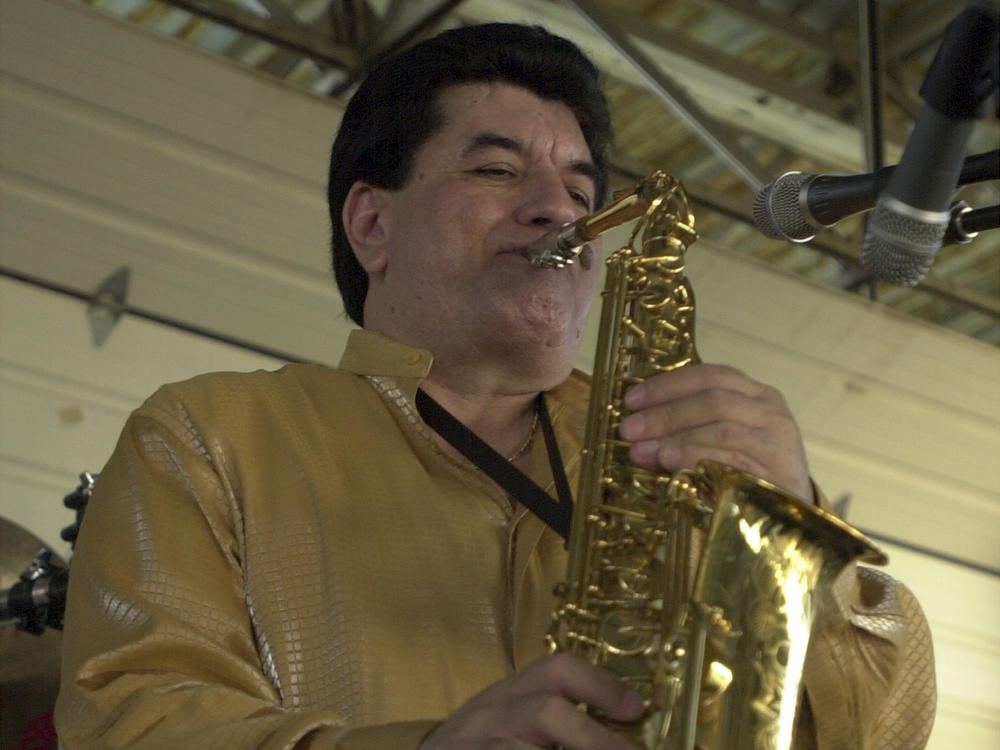 Fito Olivares performs during the Cinco de Mayo celebration held at Rosedale Park on May 5, 2002 in San Antonio, Texas. Olivares, known for songs that were wedding and quinceañera mainstays including the hit 