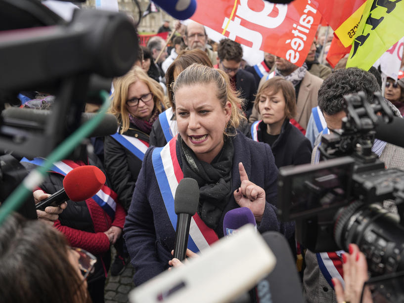 Lawmaker and far-left group leader Mathilde Panot gestures as she speaks to the media Monday during a protest against the retirement bill in Paris.