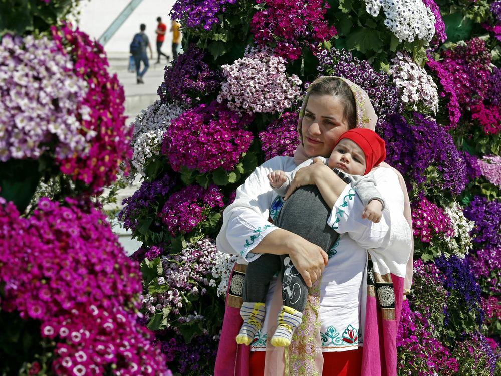 People gather in Tehran's Azadi Square on March 20, 2023 to celebrate Nowruz, the Persian New Year.