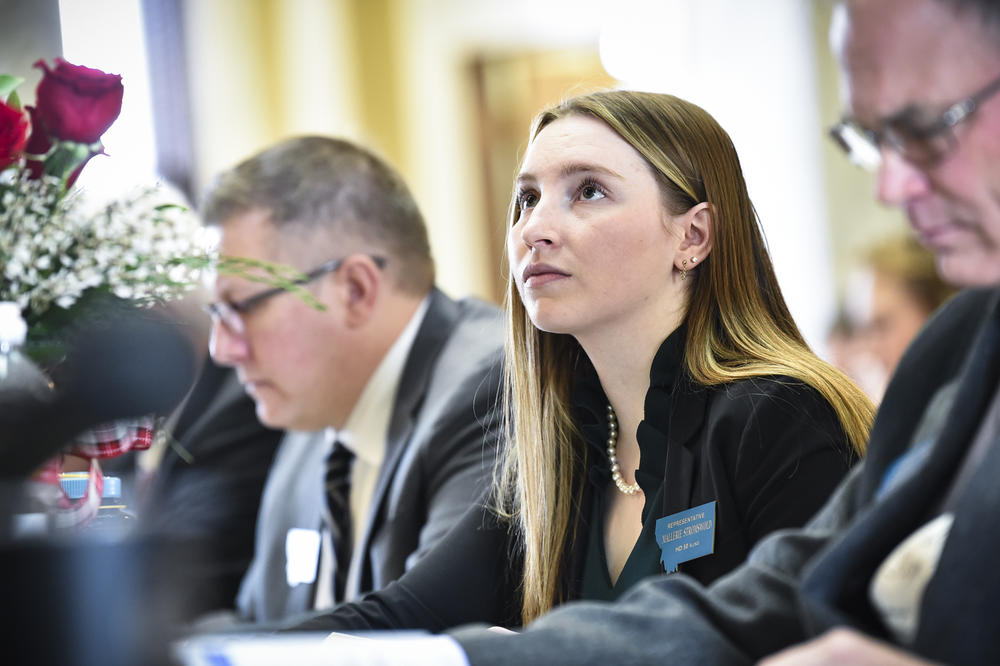 Republican state Rep. Mallerie Stromswold votes on a bill on the House floor of the Montana state Capitol on Jan. 13, 2023.