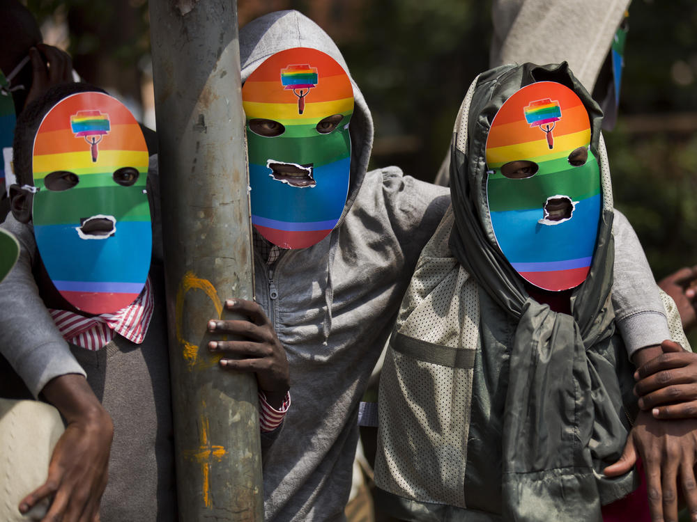 Kenyan gays and lesbians and others supporting their cause wear masks to preserve their anonymity as they stage a rare protest against Uganda's tough stance against homosexuality and in solidarity with their counterparts there, outside the Uganda High Commission in Nairobi, Kenya, in 2014.