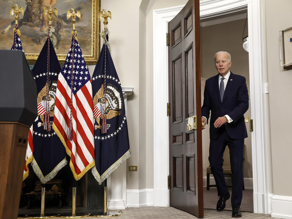 President Biden enters the Roosevelt Room on March 13 to talk about why the government backstopped all deposits at two failed banks.