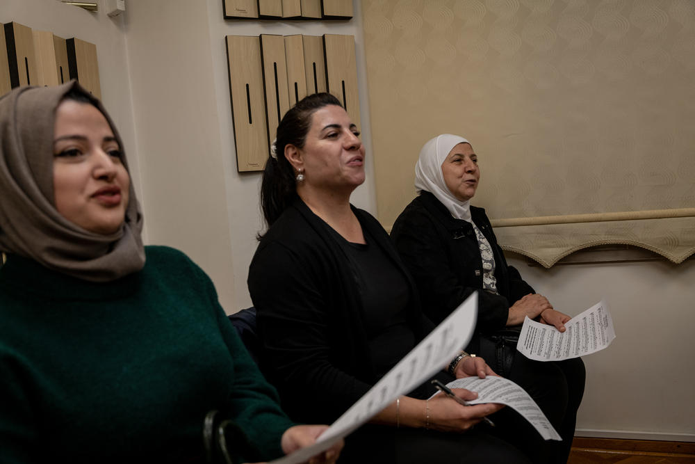 Students including Rafeef Saffaf Oflazoglu (middle) sing a 500-year-old song from the Ottoman archives, on Nov. 22, 2022.
