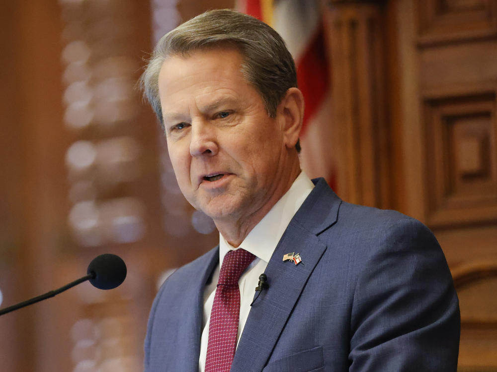 Georgia Gov. Brian Kemp, seen delivering the State of the State address on Jan. 25, has signed a bill that would ban most gender-affirming surgeries and hormone replacement therapies for transgender people under 18.