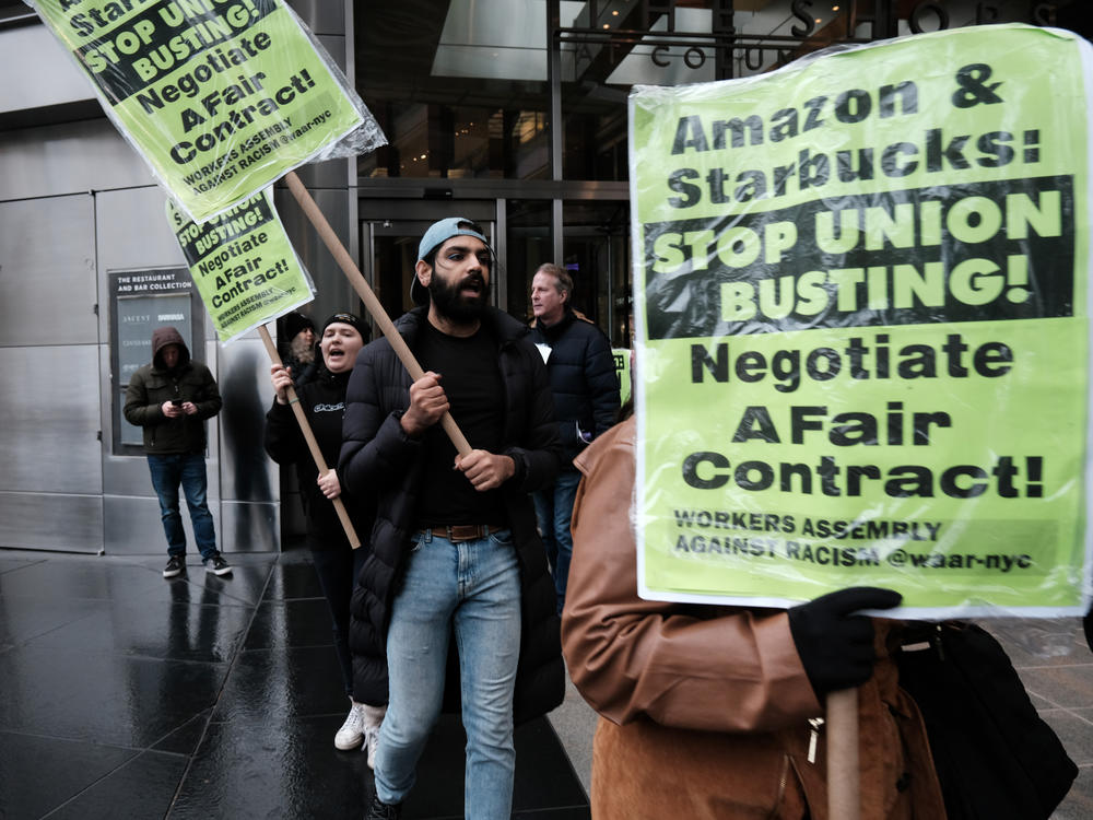 Members of the Amazon Labor Union and others protest outside the New York Times DealBook Summit on Nov. 30, 2022, as Amazon CEO Andy Jassy is scheduled to speak.