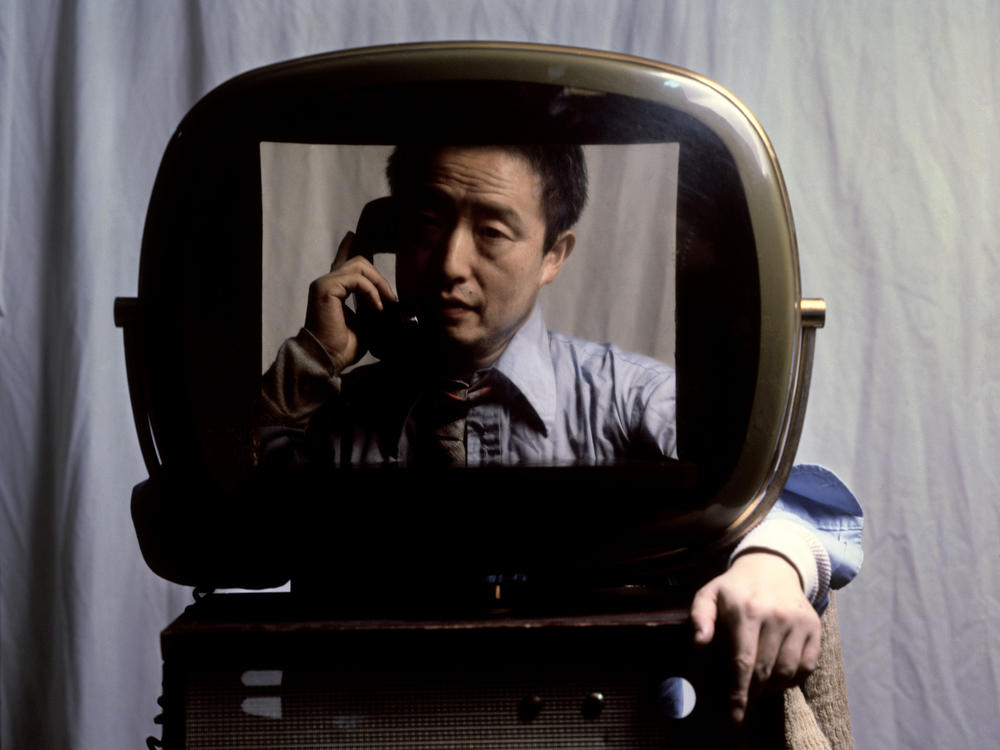 Nam June Paik, a Korean-born artist who blazed a trail in the fine art world by using video as a medium, is the subject of the new documentary <em>Nam June Paik: Moon Is the Oldest TV. </em> Above, the artist in 1982.