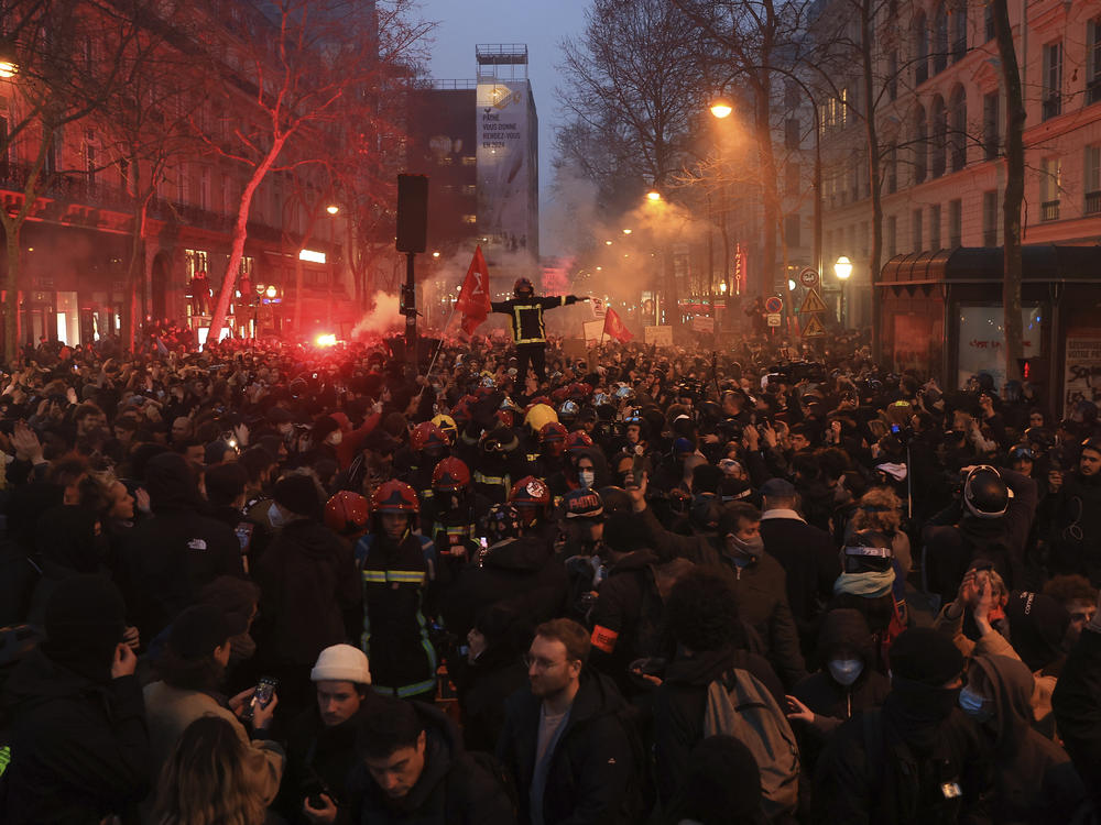 Protesters march during a rally in Paris, Thursday, March 23, 2023.