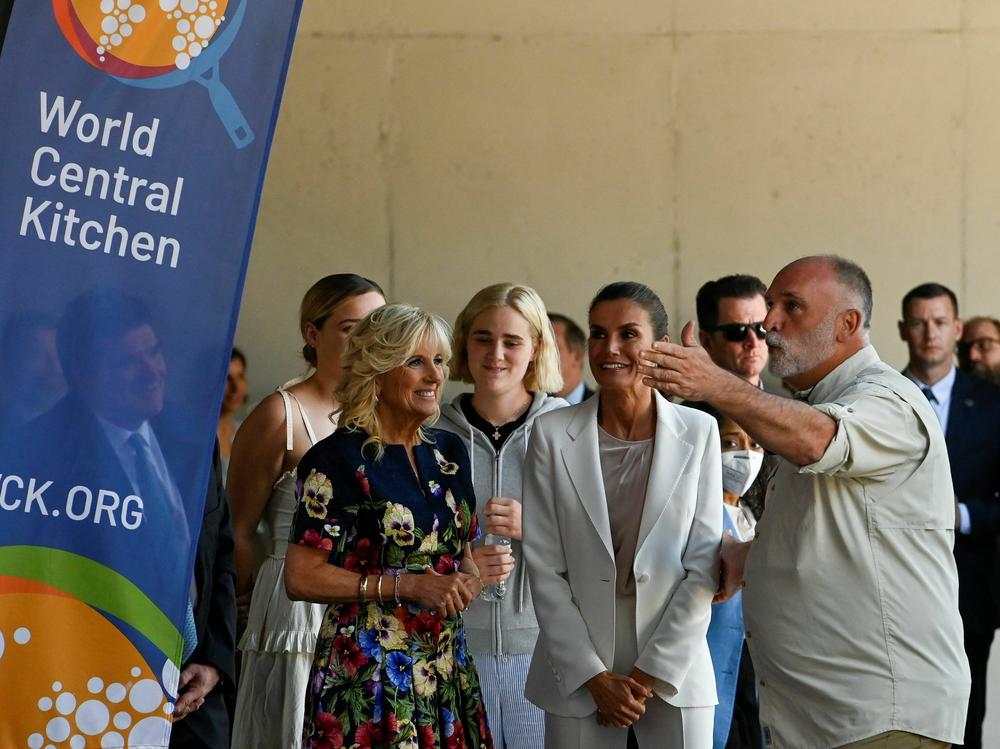 Spain's Queen Letizia and first lady Jill Biden speak with chef Jose Andres, of the World Central Kitchen association, during a visit of a reception centre for Ukrainian refugees on June 28, 2022.