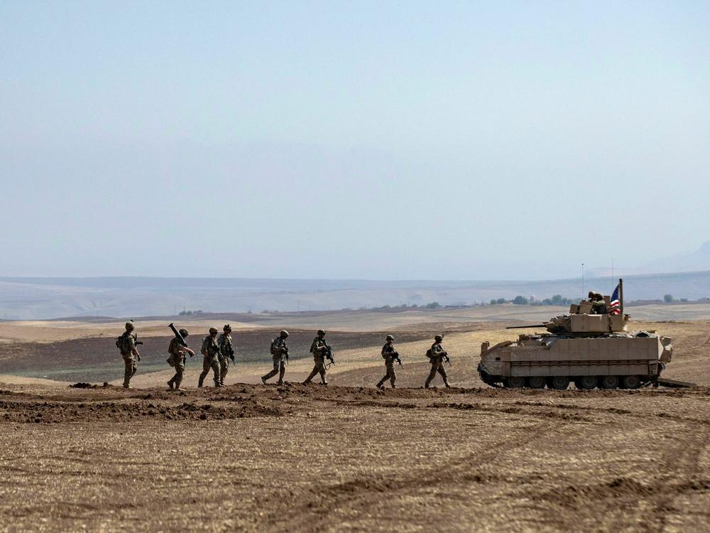 U.S. soldiers participate in a joint military exercise in northeastern Hasakah province in September 2022.