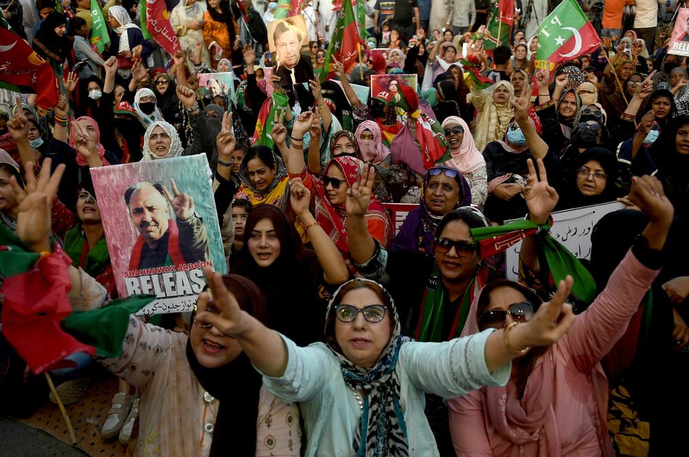 Supporters of Imran Khan, Pakistan's former prime minister, shout slogans during a protest in Karachi on March 19, demanding release of arrested party workers in recent police clashes.