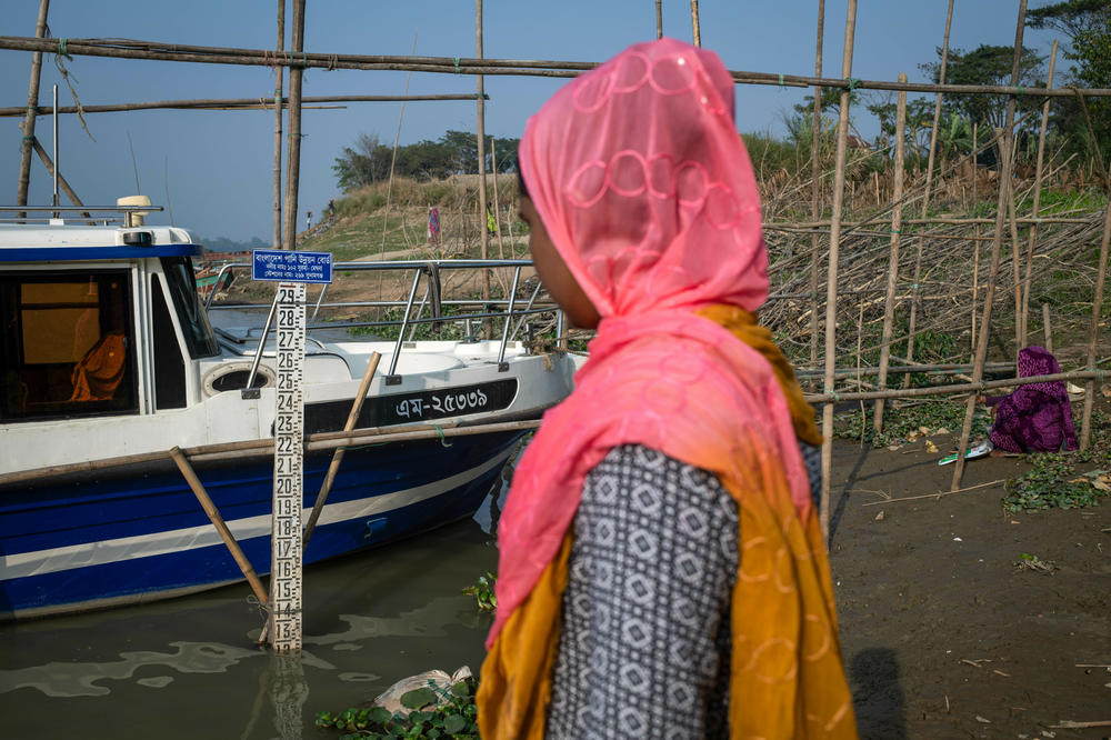Nazma Akter, 26, works as a gauge reader for Bangladesh's Flood Forecasting & Warning Centre. She reads water levels in a river near her home in the Sylhet district of northern Bangladesh and sends data to engineers in Dhaka by SMS.