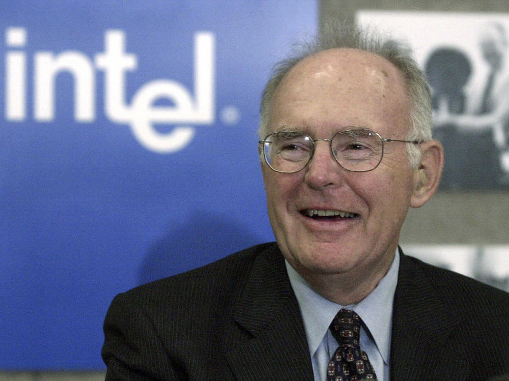 Gordon Moore, the legendary Intel Corp. co-founder who predicted the growth of the semiconductor industry, smiles during a news conference in 2001.