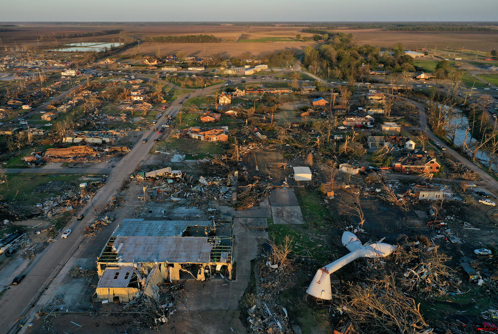 In an aerial view, damage from a series of powerful storms and at least one tornado is seen in Rolling Fork, Mississippi.