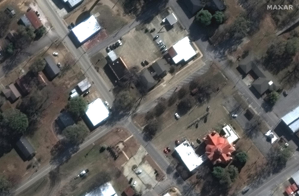 BEFORE: Tornado closer view of U.S. Post Office and county clerk office Walnut Street, Rolling Fork, Miss. on Dec. 27, 2022.
