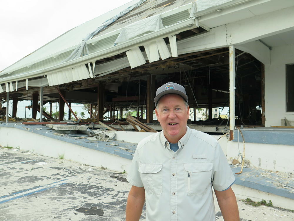 Jim Atterholt, vice mayor of Fort Myers Beach, stands in front of Chapel By the Sea. This church was destroyed by Hurricane Ian's 150 mph winds and a wall of water that pummeled the island in September 2022.