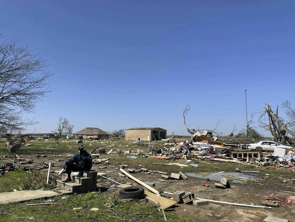 Debris covers the ground on in Silver City, Miss.