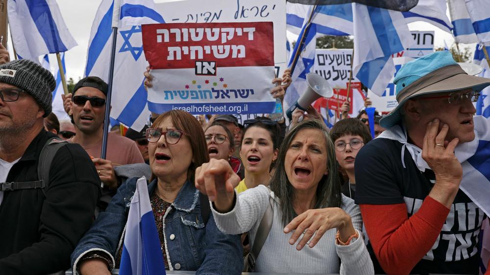 Protesters gathered outside Israel's parliament in Jerusalem on Monday, amid ongoing calls for a general strike against Prime Minister Benjamin Netanyahu's plan to weaken the court system.