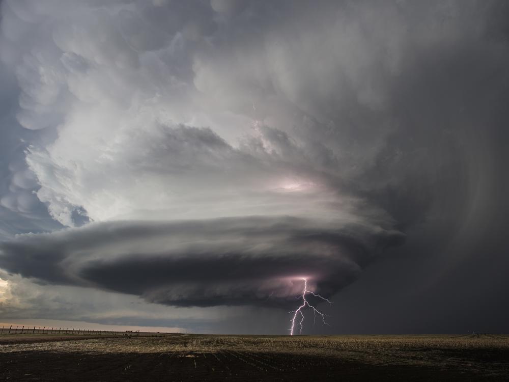 This May 21, 2020, photo provided by Victor Gensini shows a tornado in Moscow, Kan. A new study says warming will fuel more supercells or tornados in the United States and that those storms will move eastward from their current range.