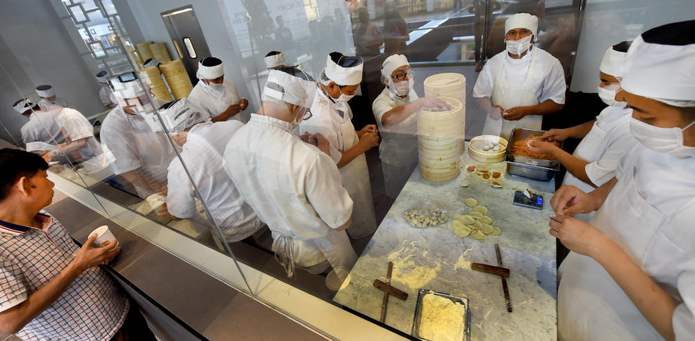 Employees make dumplings at Din Tai Fung in California's San Gabriel Valley in 2016.