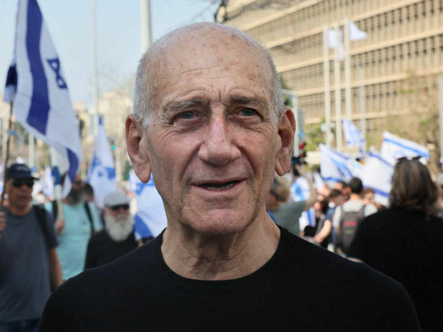 Former Israeli prime minister Ehud Olmert attends a demonstration against the Israeli government's controversial judicial overhaul bill in Tel Aviv on March 1.