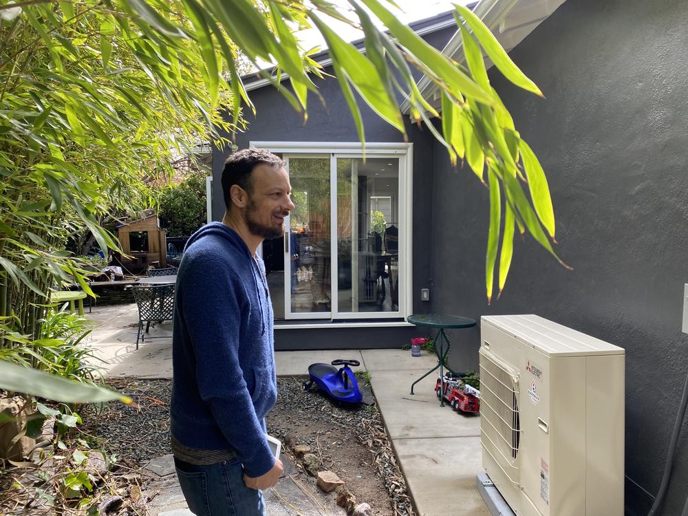 James Tucker got an efficient heat pump for his home near Oakland, Calif., last year. Now homeowners can get new credits for heat pumps from federal climate legislation.