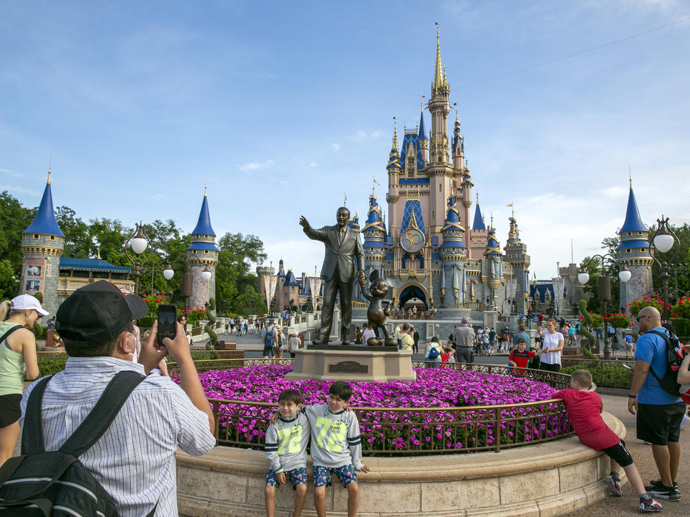 People visit Walt Disney World in Lake Buena Vista, Fla., on April 18, 2022.