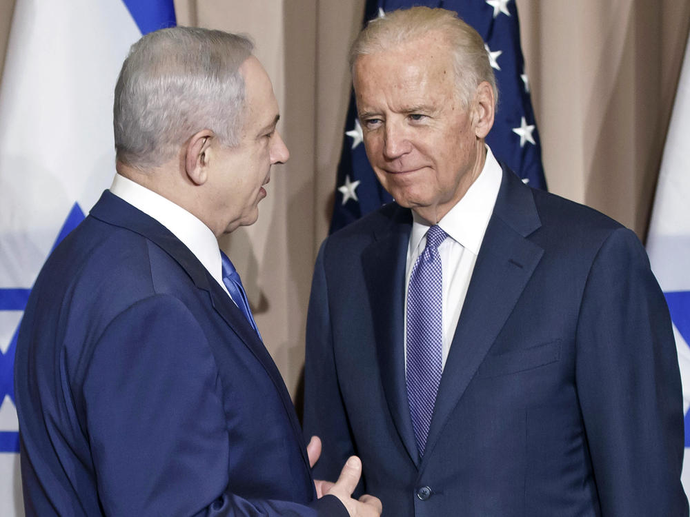 Israeli Prime Minister Benjamin Netanyahu (left) and then-Vice President Biden talk prior to a meeting on the sidelines of the World Economic Forum in Davos, Switzerland, Jan. 21, 2016. President Biden spoke Sunday, with Netanyahu to 