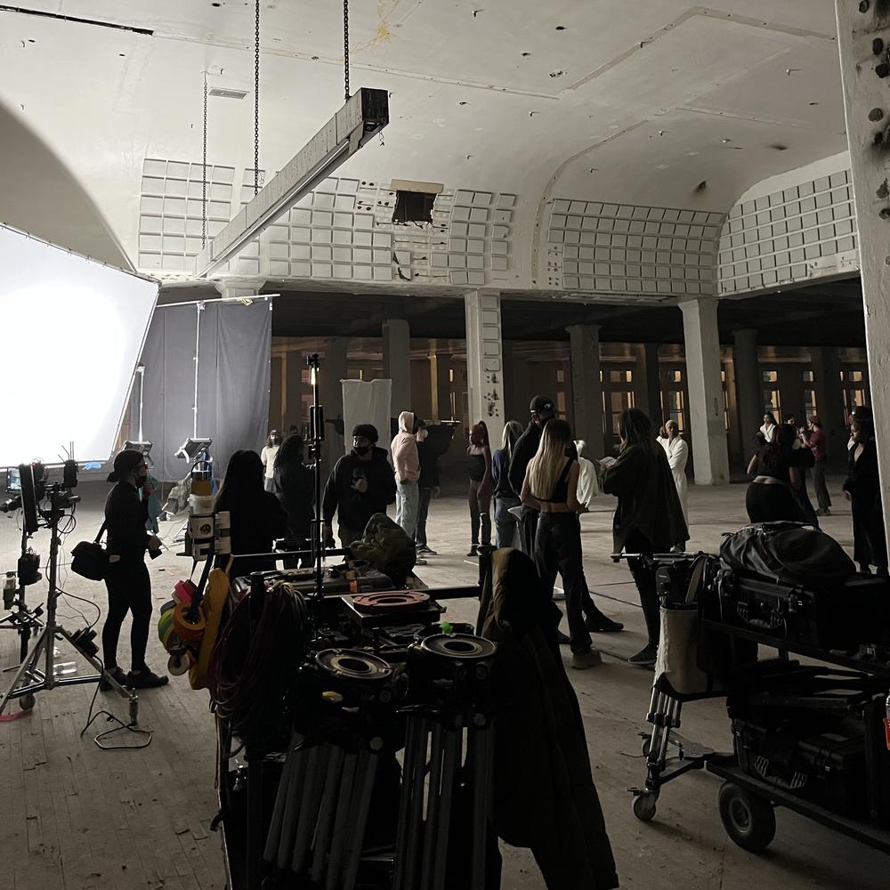 Dancers line up in a behind-the-scenes photo from the production of 