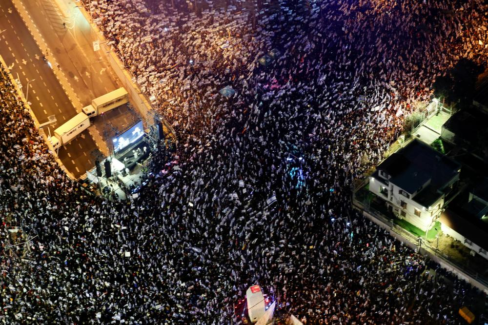 This aerial view shows people protesting in Tel Aviv against the Israeli government's judicial overhaul bill, on March 25.