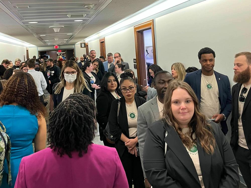 Starbucks supporters wearing shirts bearing a 