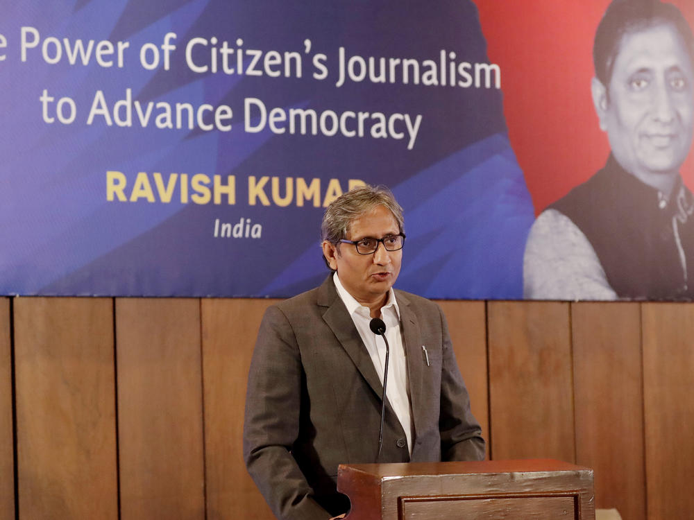 Indian journalist Ravish Kumar delivers a lecture on Sept. 6, 2019, in Manila, Philippines. Kumar, one of India's best-known TV figures, resigned from the NDTV channel after a business magnate with close ties to Prime Minister Narendra Modi, whose government has chipped away at press freedoms, announced his move to acquire the channel.