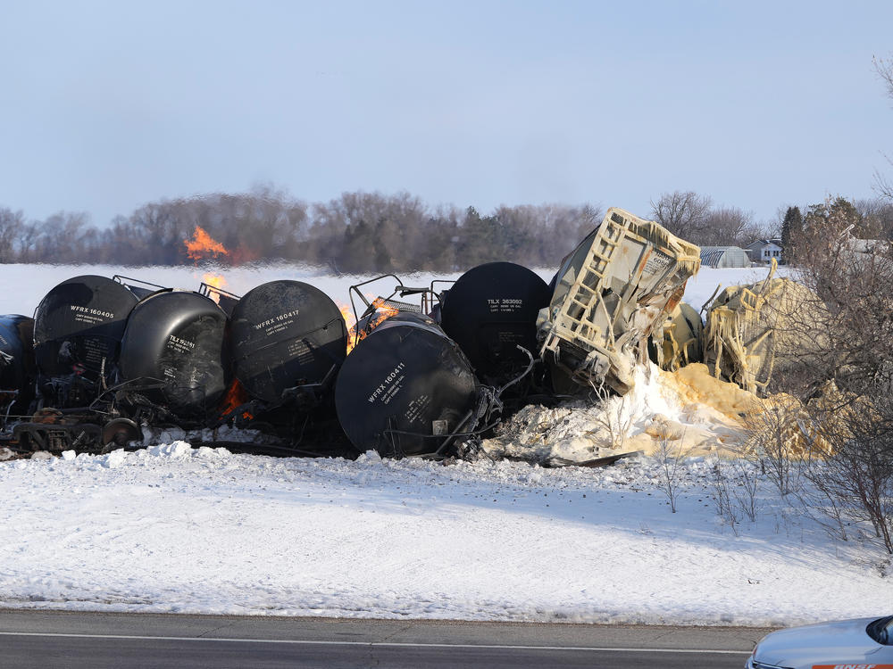 The scene Thursday morning after a BNSF train carrying ethanol and corn syrup derailed and caught fire in the west-central Minnesota town of Raymond. Residents living near the derailment were evacuated in the middle of the night.