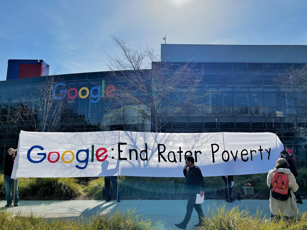 Google raters get ready for a rally at the company's Silicon Valley headquarters on Feb. 1, 2023.