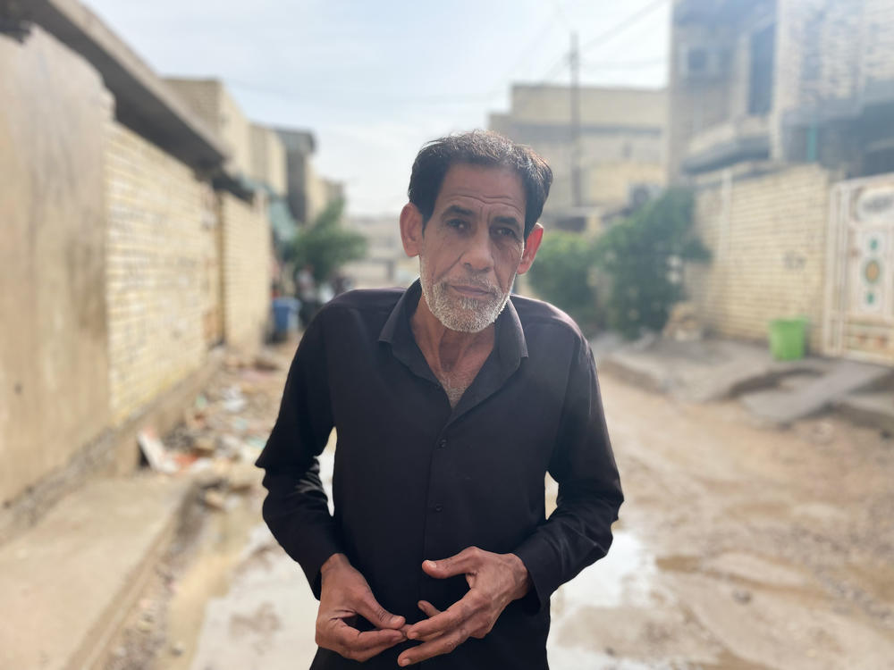 Talib al-Majli, 57, lives in a poor area in Baghdad. He says his detention in Abu Ghraib prison left him destitute and too physically weak and psychologically traumatized to find a reliable job. Now he works odd jobs, sometimes putting up signs for companies, earning around $30 per week.
